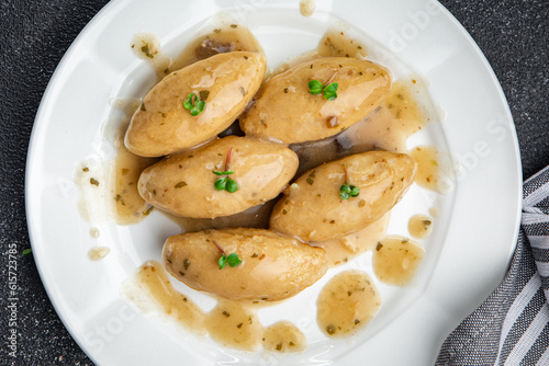 quenelles mushroom sauce meal food snack on the table copy space food background rustic top view