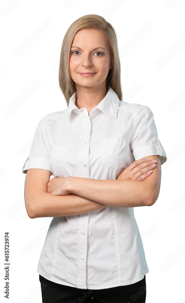Woman standing with her arms folded