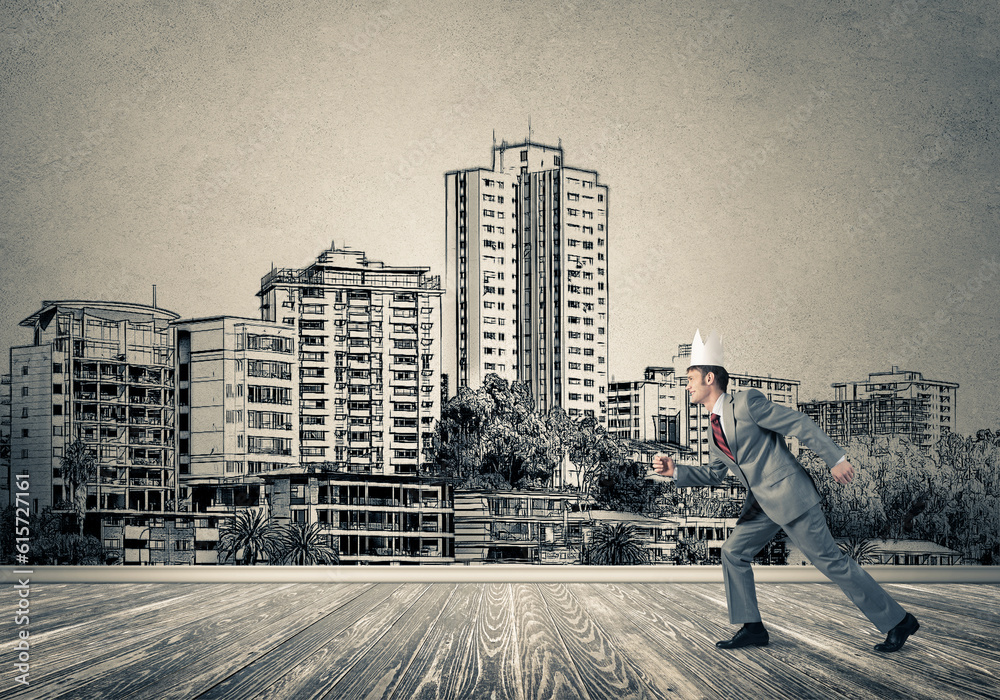 King businessman in elegant suit running and drawn cityscape silhouette at background