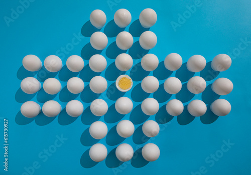A large number of eggs on a blue background