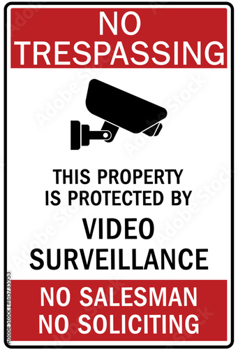 No soliciting warning sign and labels no trespassing. This property is protected by video surveillance