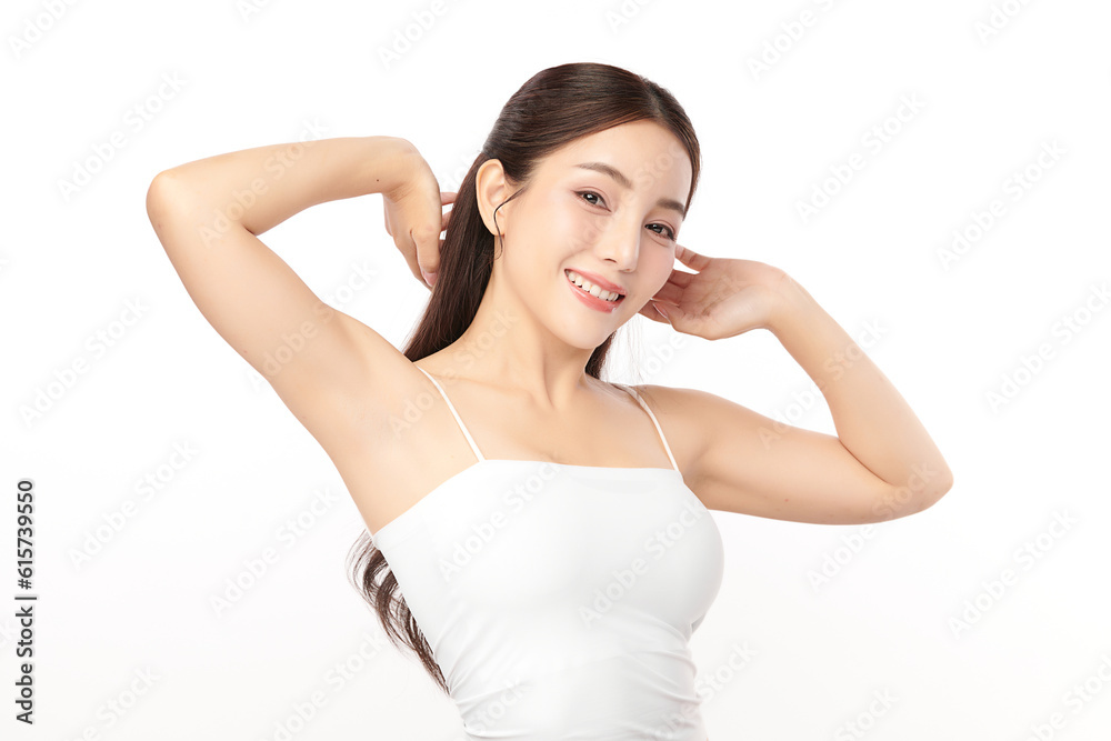 Beautiful Young Asian woman lifting hands up to show off clean and hygienic armpits or underarms on white background, Smooth armpit cleanliness and protection concept Beautiful Young Asian woman lifting hands up to show off clean and hygienic armpits or underarms on white background, Smooth armpit cleanliness and protection concept