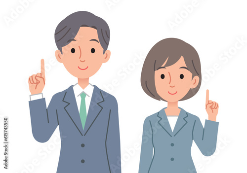 指差しで説明をするビジネスパーソン男女