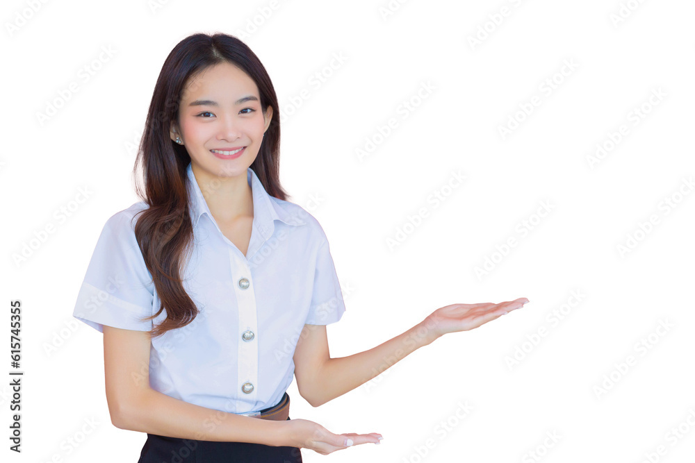 Portrait of adult Thai student. Beautiful Asian young woman student in uniform is smiling and looking at camera to present something confidently on white background in the university Portrait of adult Thai student. Beautiful Asian young woman student in uniform is smiling and looking at camera to present something confidently on white background in the university