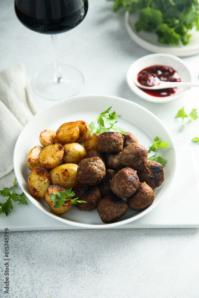 Homemade veal meatballs with potato and berry sauce Homemade veal meatballs with potato and berry sauce