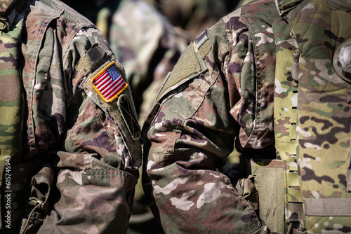 United States Army. Close up photo with the flag of America on soldiers shoulder uniform, US army concept image.