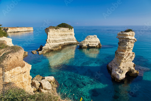 Spectacular summer view of popular tourist attraction - Torre Sant Andrea. Beautiful morning seascape of Adriatic sea  Torre