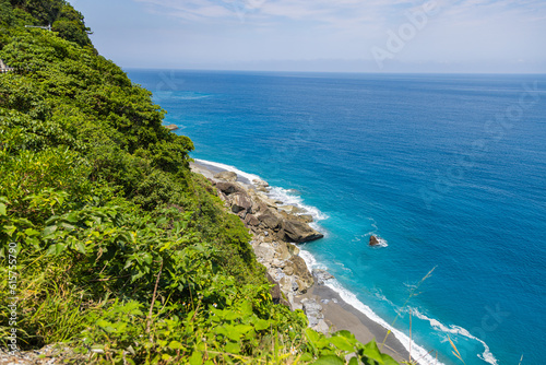 Stunning view reveals the grandeur of the cliffs at Taiwan southeast coast  Qingshui Cliff near Taroko National Park. Towering and lush  they overlook the azure sea  evoking a sense of awe. Landscape