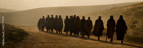 apostles are going to preach in the Judean desert. Men walk across a sandy landscape photo