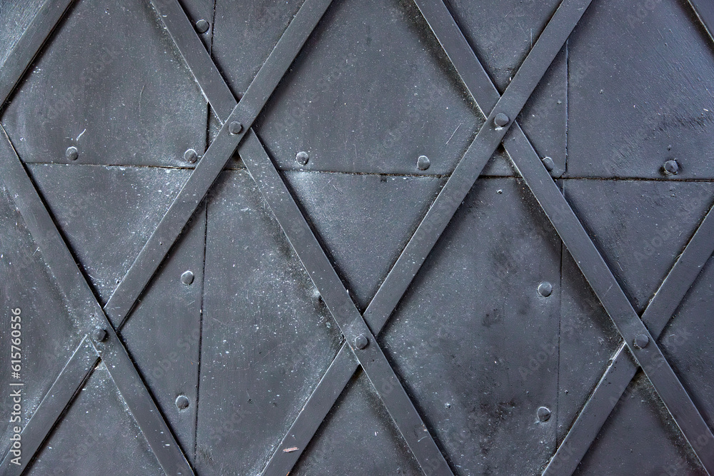 Obraz premium Metallic door with rhombus shape texture background