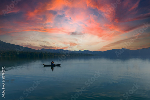 Beautiful view of Lake Batur overlooking the calm and beautiful Mount Batur photo