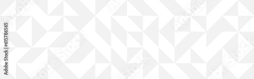 Trendy geometric background in light gray and white shades, template for web design and wallpapers. Texture of triangles and squares in mosaic, modern pattern.