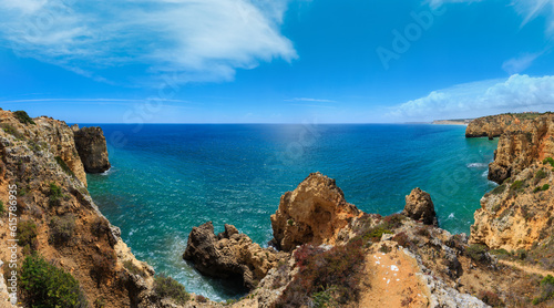 Atlantic ocean summer rocky coastline view (Ponta da Piedade, Lagos, Algarve, Portugal). © wildman