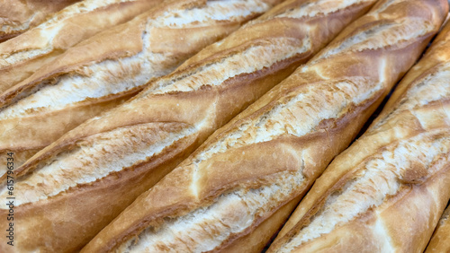 Baguette bread. Close-up of breads lined up on the oven counter