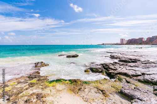 Cancun Mexico beautiful caribbean sea on a sunny day and cloudy sky. Exotic Paradise. Travel, Tourism and Vacations Concept. Tropical Resort.