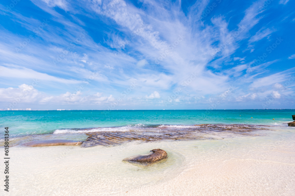 Cancun Mexico beautiful caribbean sea on a sunny day and cloudy sky. Exotic Paradise. Travel, Tourism and Vacations Concept. Tropical Resort. Cancun Mexico beautiful caribbean sea on a sunny day and cloudy sky. Exotic Paradise. Travel, Tourism and Vacations Concept. Tropical Resort.