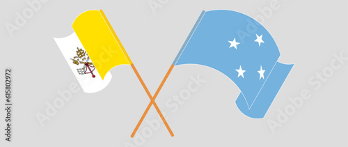 Crossed and waving flags of Vatican and Micronesia