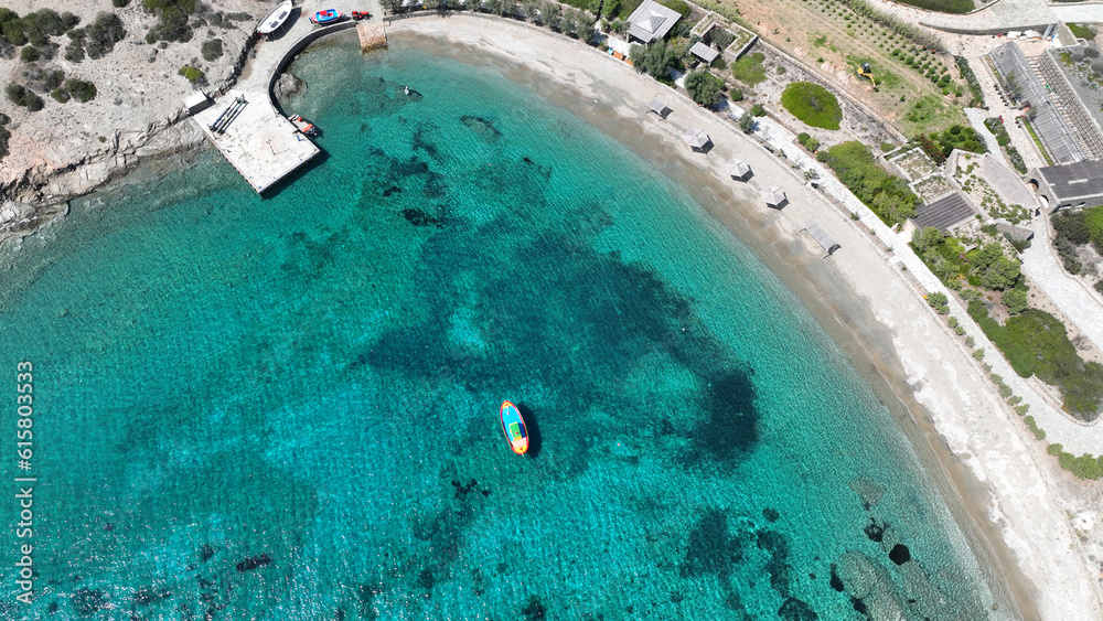 Aerial drone photo of paradise secluded beach of Agios Vasileios located in long peninsula of small island of Schoinousa, Small Cyclades, Greece
