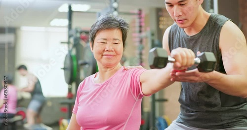 Asian elderly sports in gym photo