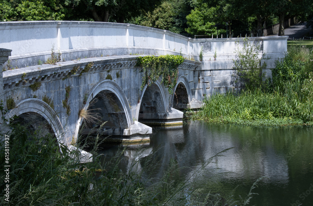old arched bridge over the river
