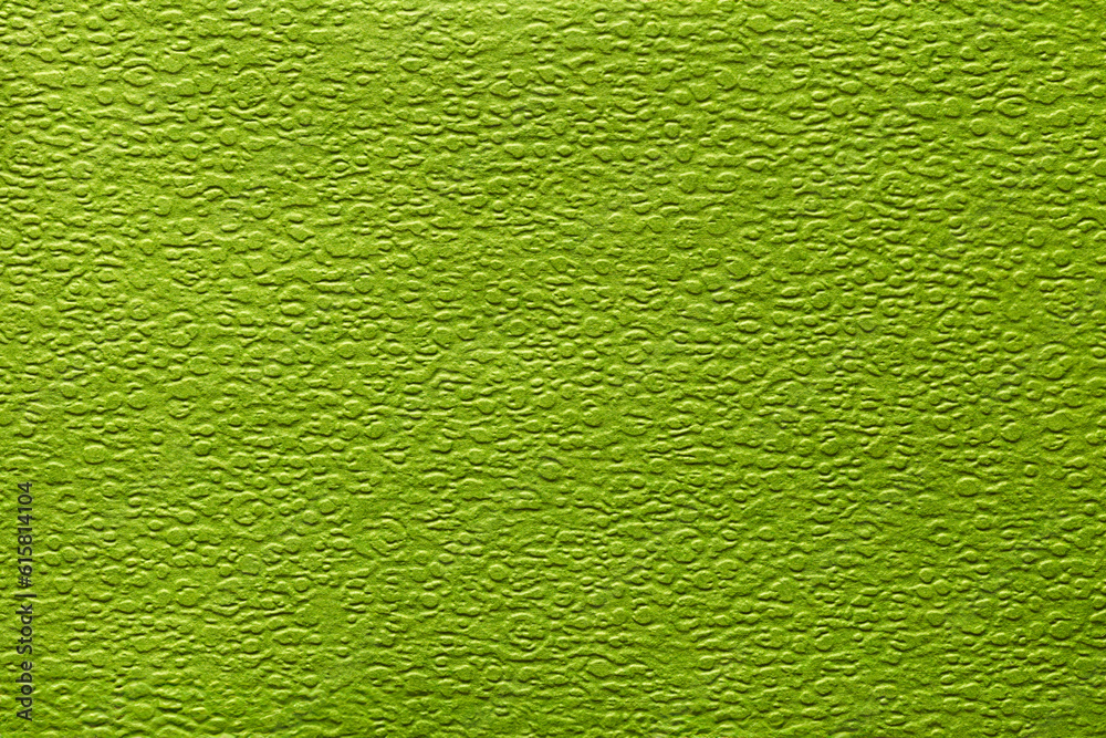Green color eco recycled kraft paper sheet texture cardboard background. Green color eco recycled kraft paper sheet texture cardboard background.