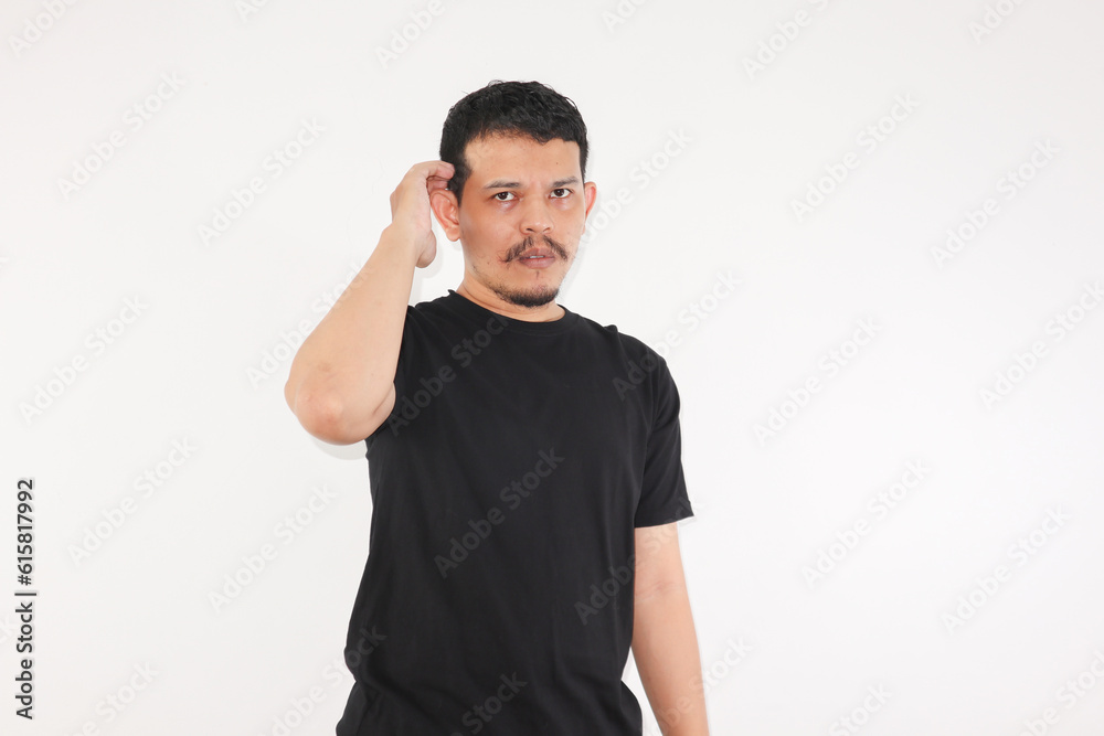 Worries face expression of Asian man who got problem, scratching his head, isolated on white. Worries face expression of Asian man who got problem, scratching his head, isolated on white.