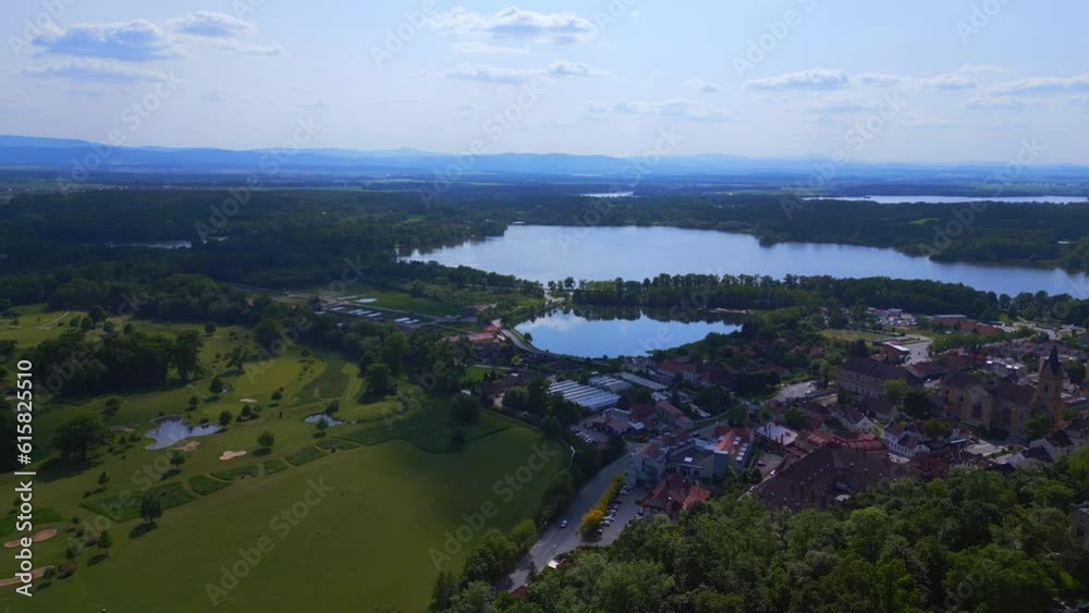 white Fairy tale Castle in Czech Republic. Majestic aerial top view flight drone white Fairy tale Castle in Czech Republic. Majestic aerial top view flight drone