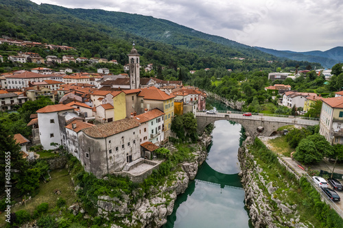 Aerial drone view of Kanal na Soci town in Slovenia and Soca river.
