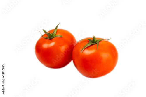 Red tomato isolated on white background. Fresh red tomatoes. Fresh vegetables. Vegan. Close-up. Healthy food. Salad Ingredients.