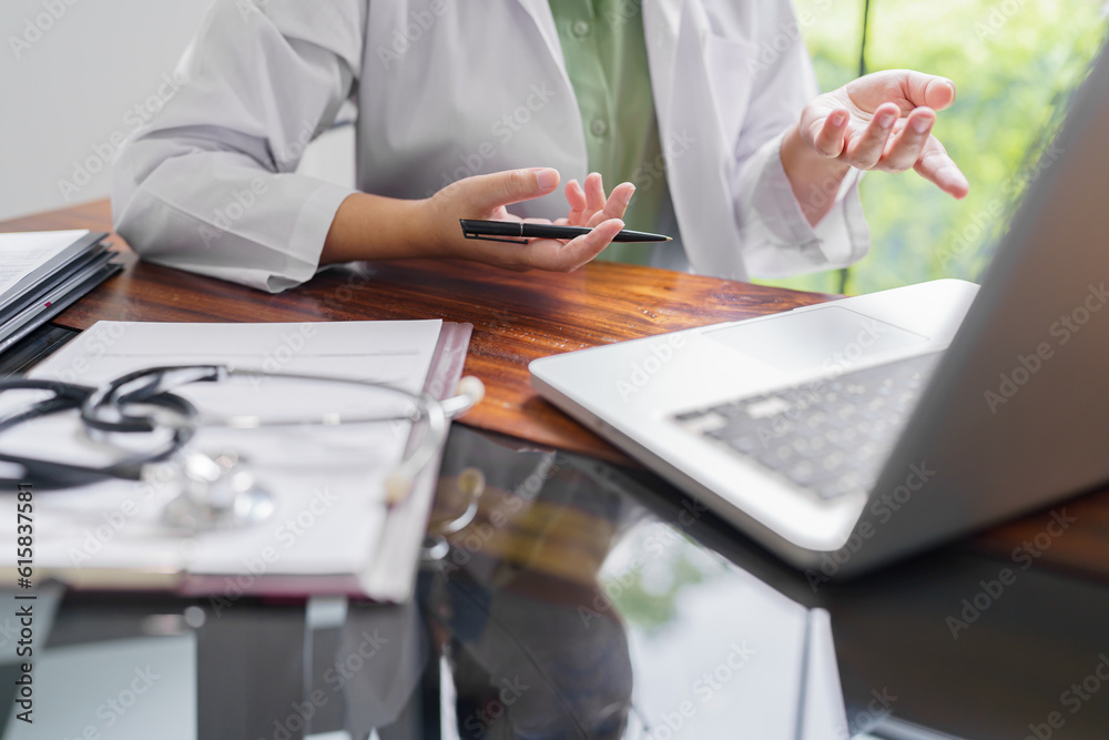 Doctor talking to online patient on laptop online consultation health treatment. medical appointment at home having online consultation Doctor talking to online patient on laptop online consultation health treatment. medical appointment at home having online consultation