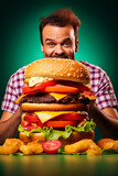 Big hamburger on the table and very hungry man ready to eat the burger. Generative Ai image