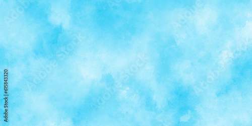Defocused and blurry wet ink effect sky blue color watercolor background, blurred and grainy Blue powder explosion on white background, Classic hand painted Blue watercolor background for design. 
