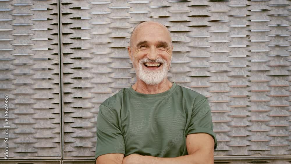 80 years old man making sport and different activities outdoor. Senior man training in the city. Concept about healthy lifestyle and seniority 80 years old man making sport and different activities outdoor. Senior man training in the city. Concept about healthy lifestyle and seniority