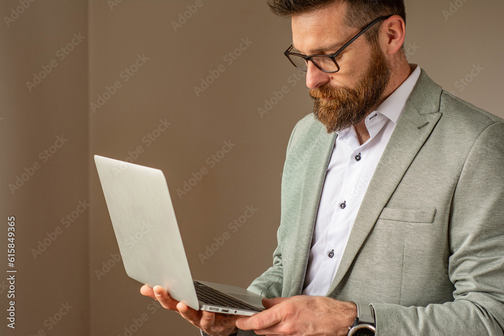 Portrait of successful businessman in office Portrait of successful businessman in office