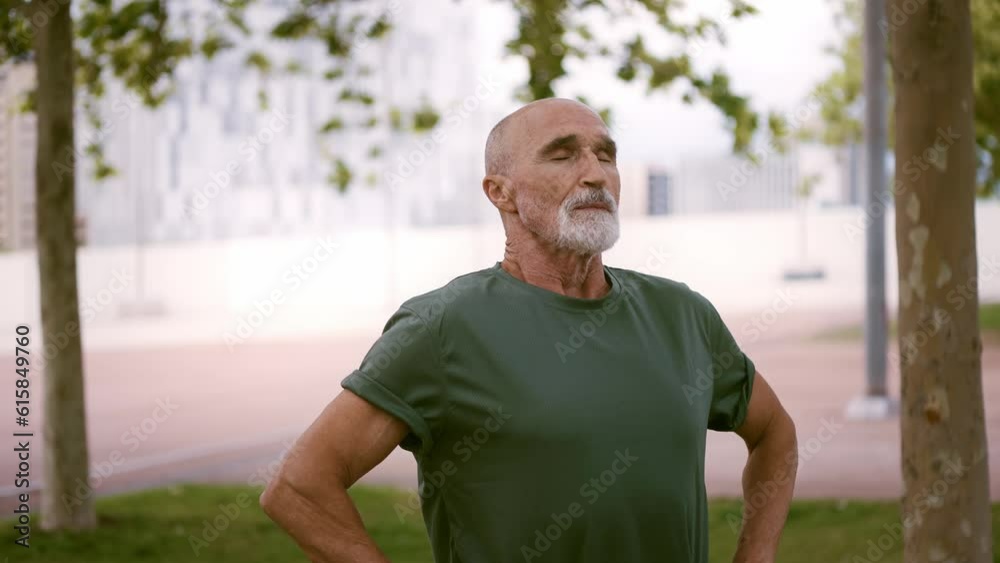 80 years old man making sport and different activities outdoor. Senior man training in the city. Concept about healthy lifestyle and seniority