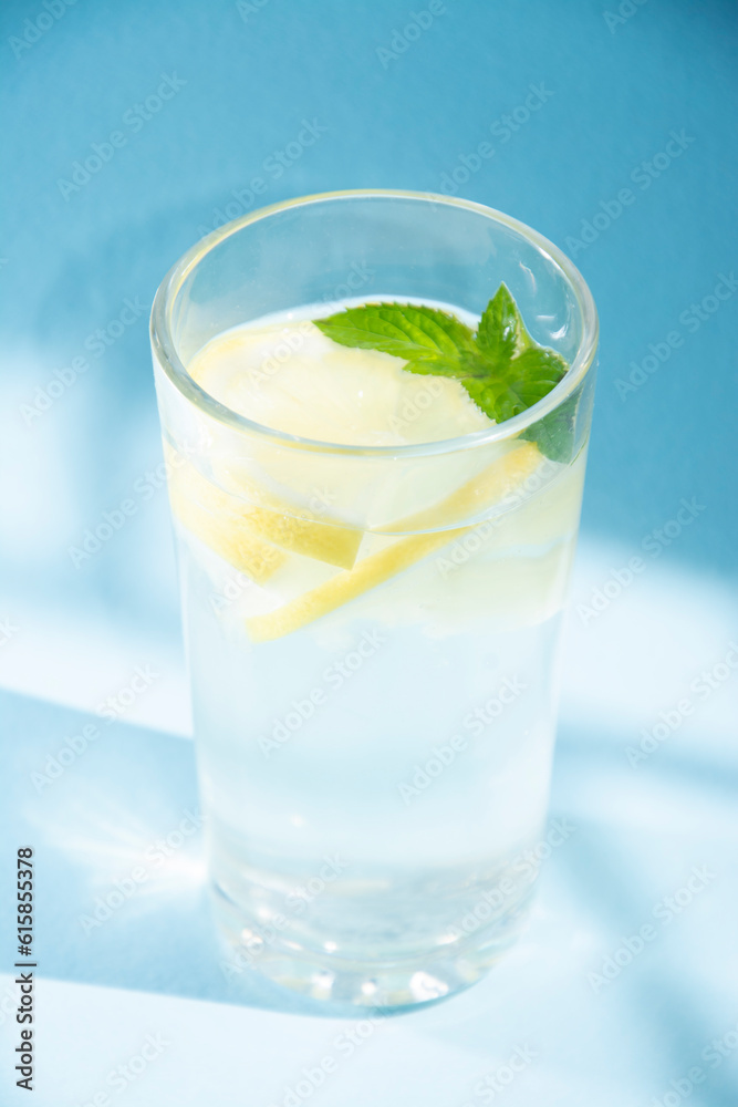 Glass of lemon water with mint
