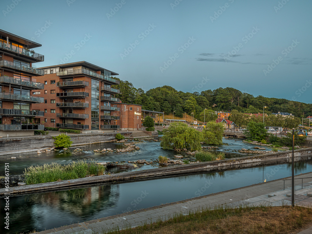 the town center of Silkeborg with the Gudena river in the soft evening light