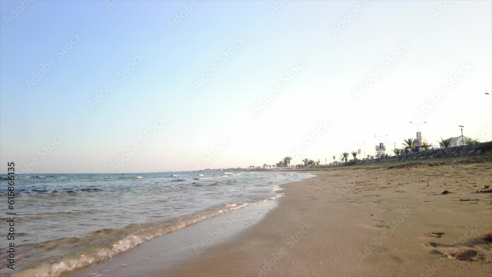 Camera movement coastline sea movement strips of water on the sand against the sky. View from the eyes of a walker. Open space in the air. Camera movement coastline sea movement strips of water on the sand against the sky. View from the eyes of a walker. Open space in the air.