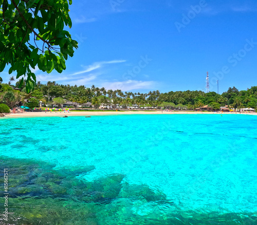 Fototapeta Naklejka Na Ścianę i Meble -  Kho Rasha island off the coast of phuket thailand by speed bias from Chalong Bay, beautiful turquoise Blue beach with white soft sand and lush green trees 