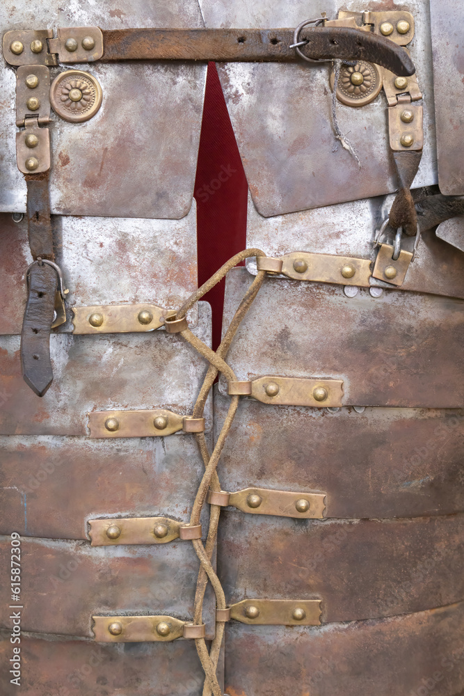 foreground detail photography of armor af a soldier froma ancient roman empire, lorica segmentata foreground detail photography of armor af a soldier froma ancient roman empire, lorica segmentata