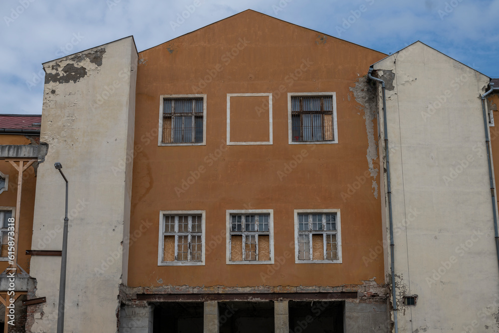 Obraz premium Exploring the Historic Abandoned Red Cinema and Abandoned Red Theatre in Miskolc, HungaryJourney Through Time and Culture
