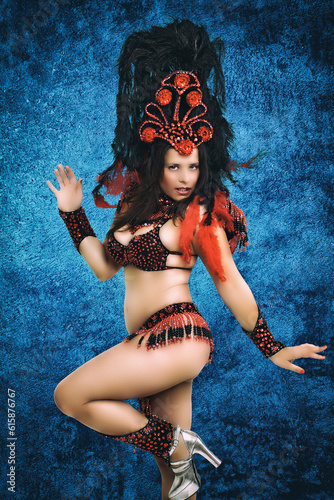 beautiful model in brazilian carnival costume dancing in studio © Luiz Henrique Mendes