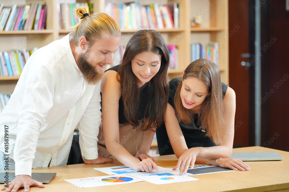 Young office worker presenting new financial plan to his partners during a meeting Young office worker presenting new financial plan to his partners during a meeting