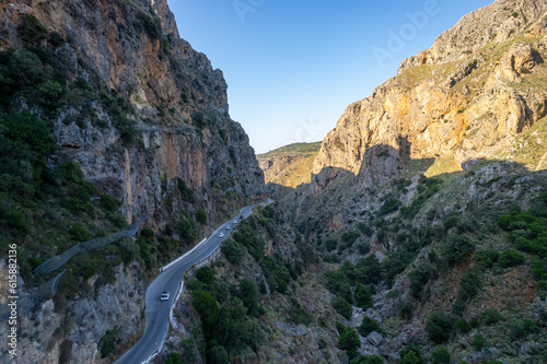 Aerial summer sunny view of serpentine mountain road near Topolia Gorge, Crete, Greece