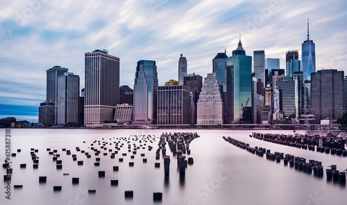 dramatic scenery of lower manhattan skyline in the evening on a cloudy day  longterm exposure