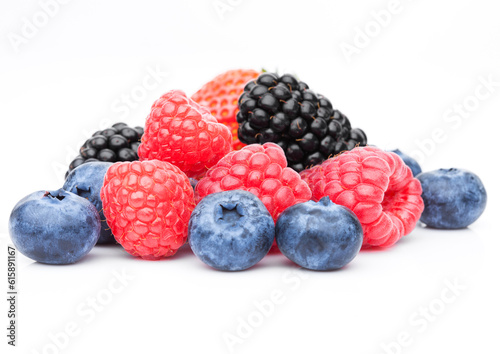 Fresh blueberry raspberry and blackberry closeup on white background