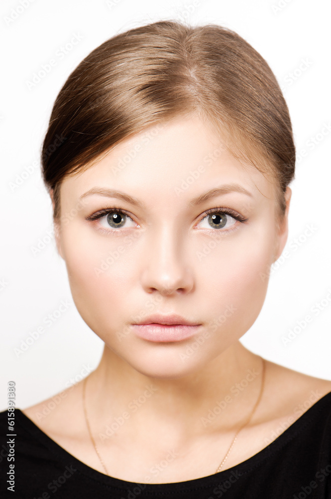 Beautiful woman face close up studio isolated on white Beautiful woman face close up studio isolated on white