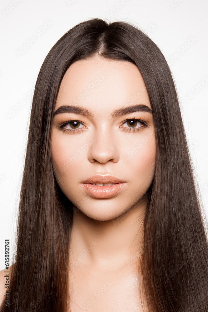 Front portrait of beautiful long haired girl isolated on white