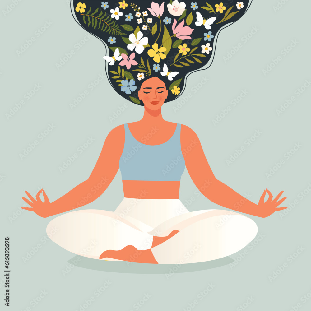 Young woman with flower hair sits in lotus pose of yoga. Free mind ...