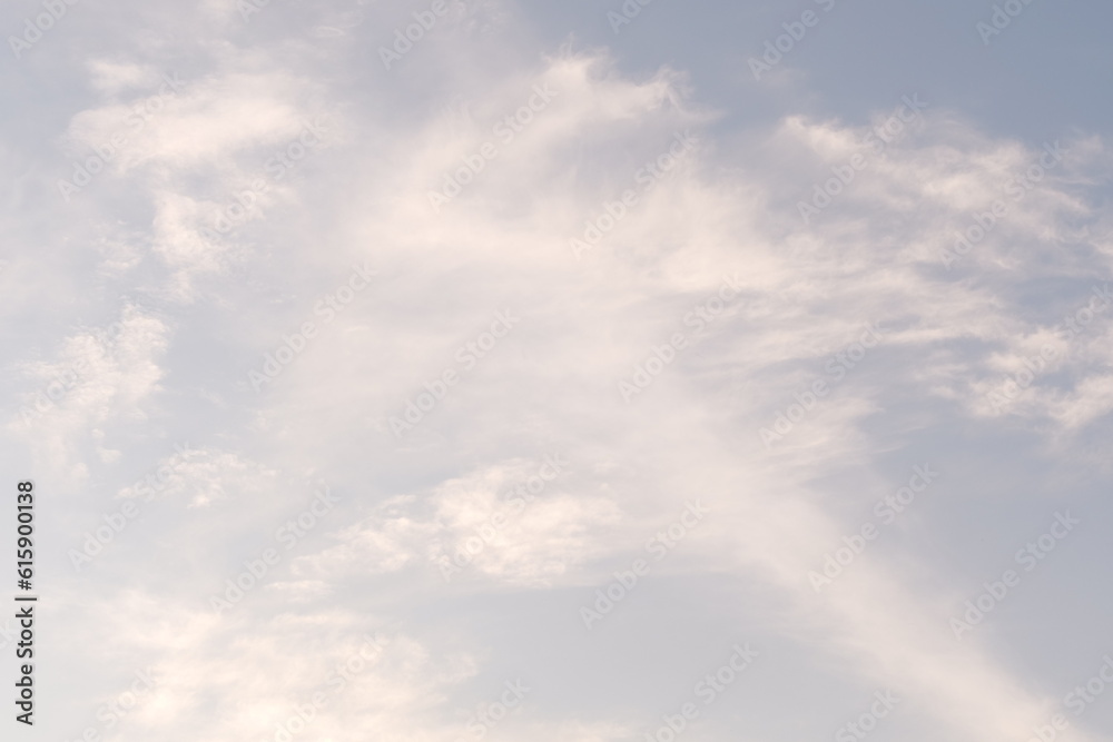 Obraz premium Background Of A Blue Sky Filled With Thin Smoky White Clouds